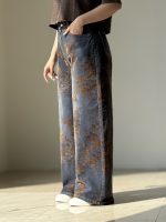 شلوار جین سرمه ای پترن گل قهوه ای کد۲۲۳۹۰۱۷